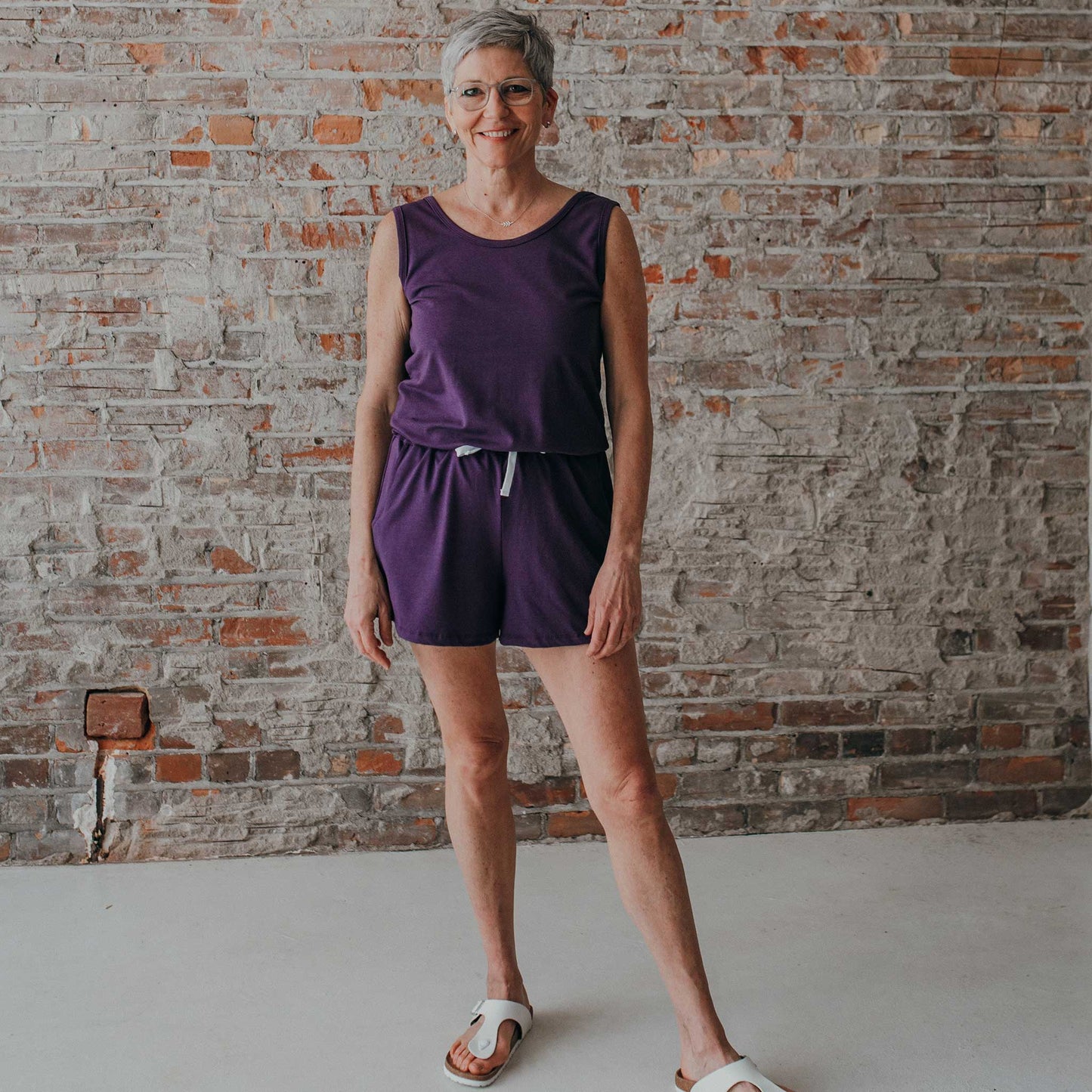Load image into Gallery viewer, Wooly Doodle | Ladies Tank Romper, No Plum Intended, Lifestyle | Medium Shown on 5&amp;#39;10&amp;quot; Woman
